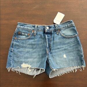 Levi's Blue Jean Shorts with Raw Hem and Distressed Look